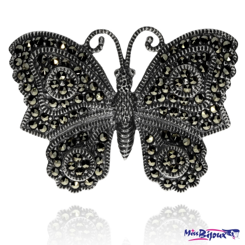 Stříbrná brož posázená markazity s motivem motýla 