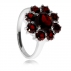 Stříbrný prsten s granáty - Květina s výrazným středovým kamenem